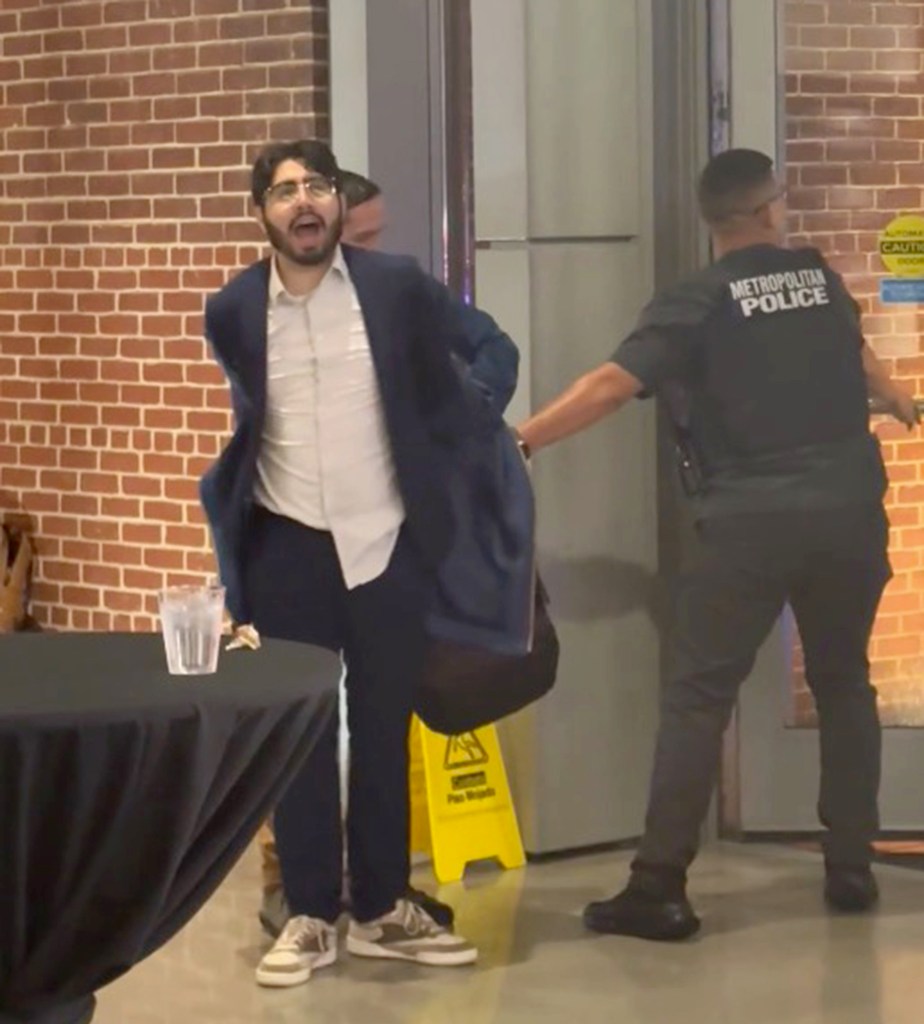 Elias Rodriguez being arrested.