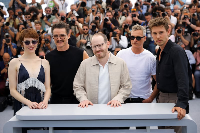 Director Ari Aster and cast members Emma Stone, Pedro Pascal, Joaquin Phoenix and Austin Butler, pose during a photocall for the film "Eddington" in competition at the 78th Cannes Film Festival in Cannes, France, May 17, 2025. REUTERS/Stephane Mahe     TPX IMAGES OF THE DAY