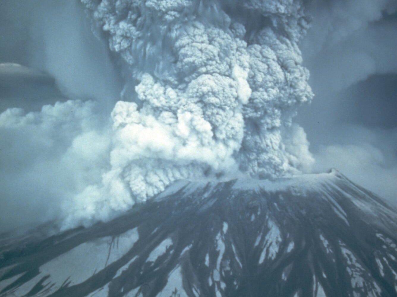 Smoke and ash pouring out of a volcano