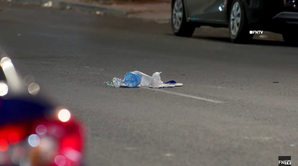 Debris in the street at the scene of the hit-and-run ear Marcus Garvey Boulevard and Van Buren Street.