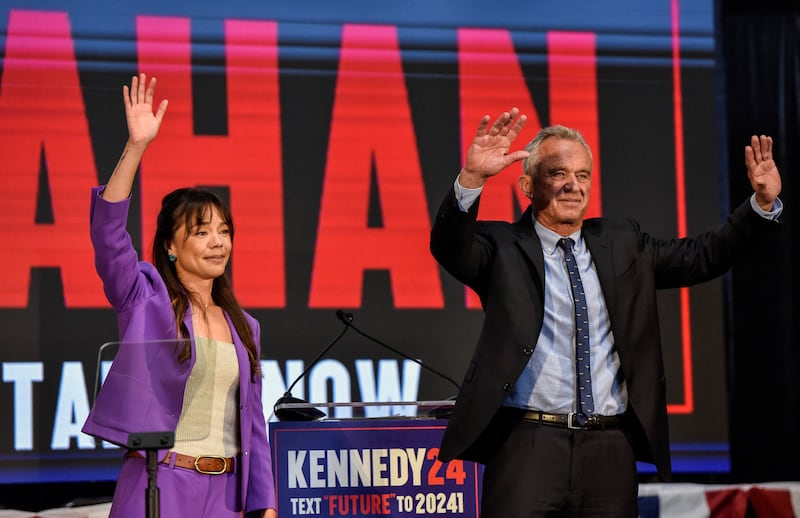 Independent presidential candidate Robert F. Kennedy, Jr. and Nicole Shanahan greet people as she becomes the vice presidential candidate of Kennedy, in Oakland, California., U.S., March 26, 2024. REUTERS/Laure Andrillon