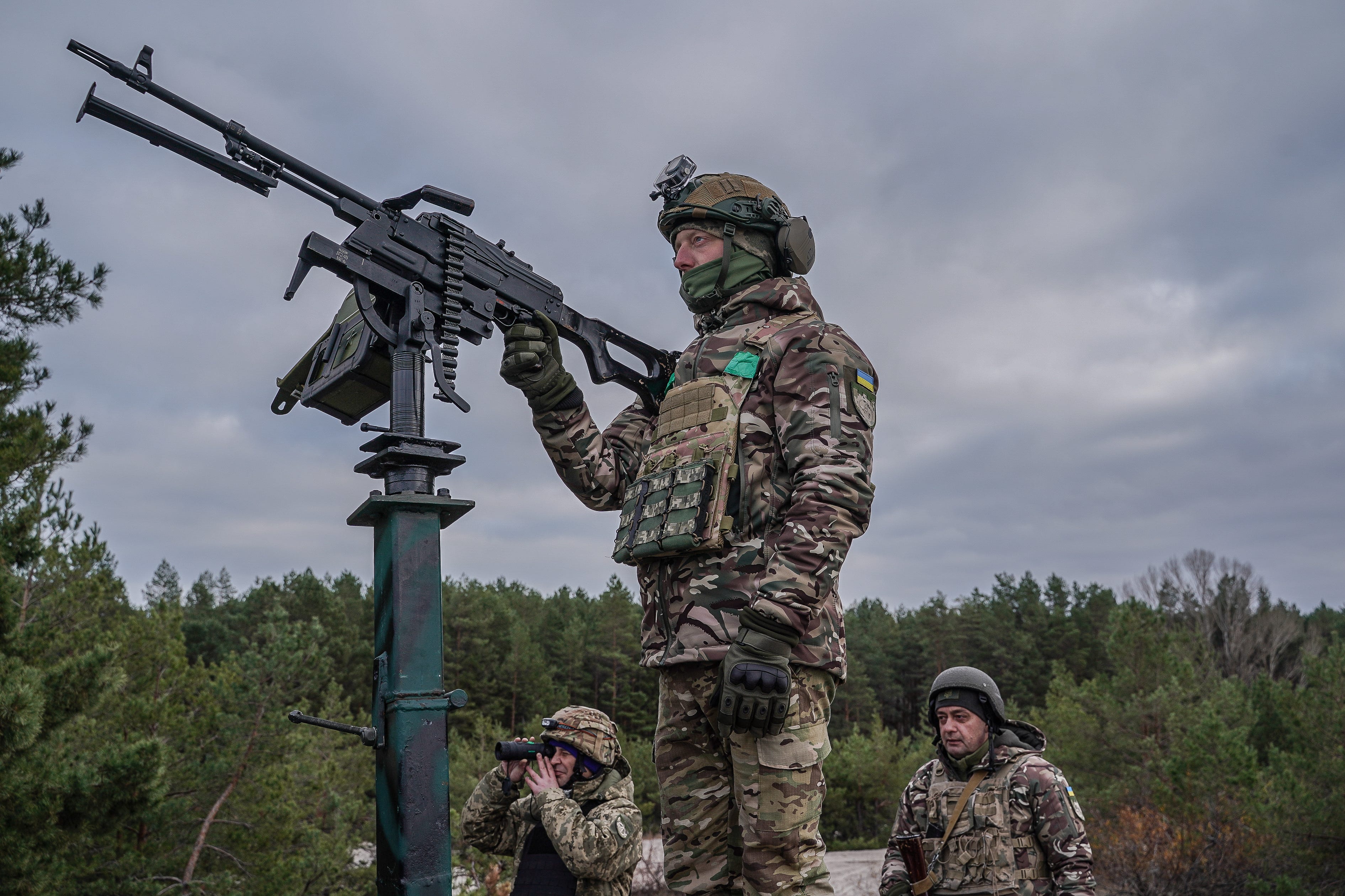 Ukrainian servicemen of the mobile anti-aircraft fire group of the 112th Territorial Defense Brigade prepare anti-UAV machine guns on November 24, 2024 in Kyiv Oblast, Ukraine.