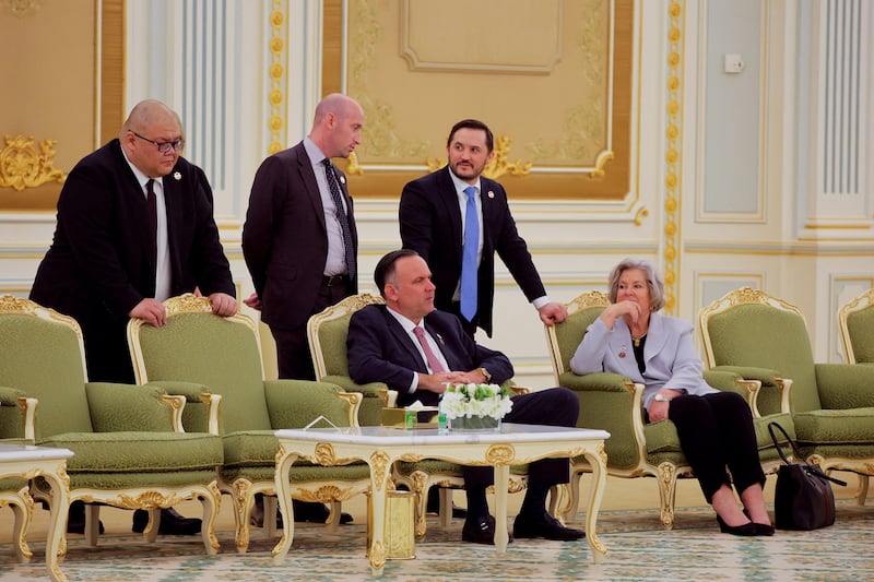 White House Communications Director Stephen Cheung (far left) is pictured with a group of Trump staffers during a ceremony at the Royal Court in Riyadh, Saudi Arabia, May 13, 2025.