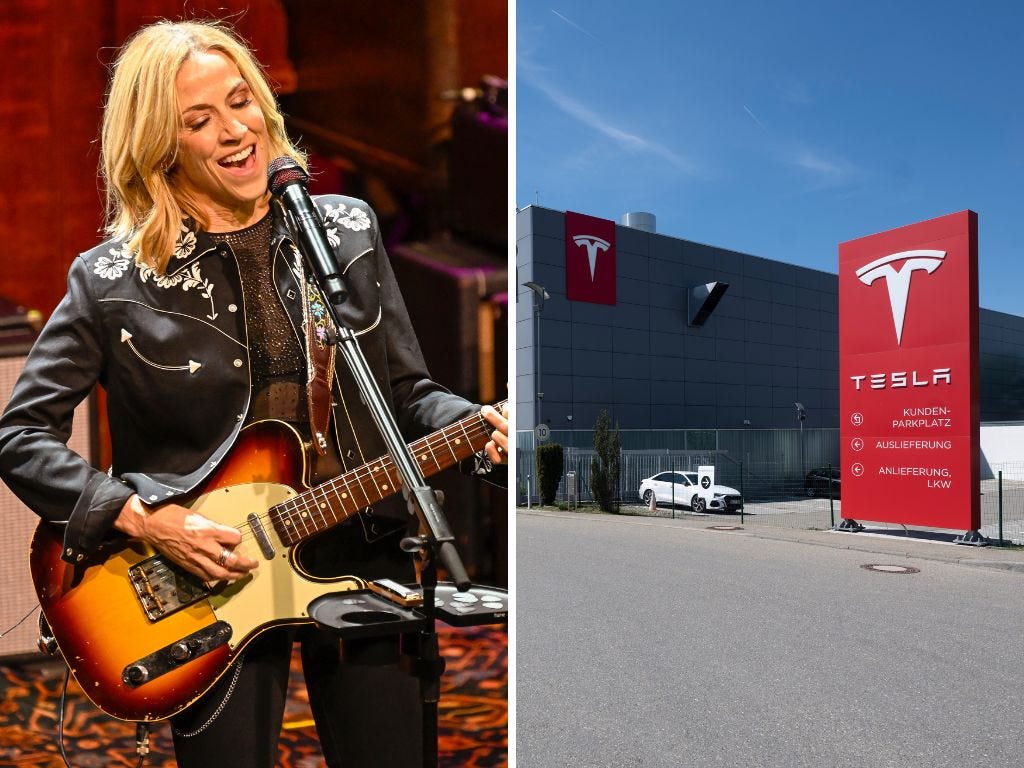 Sheryl Crow performing with her guitar; Tesla delivery center in Holzgerlingen, Germany.