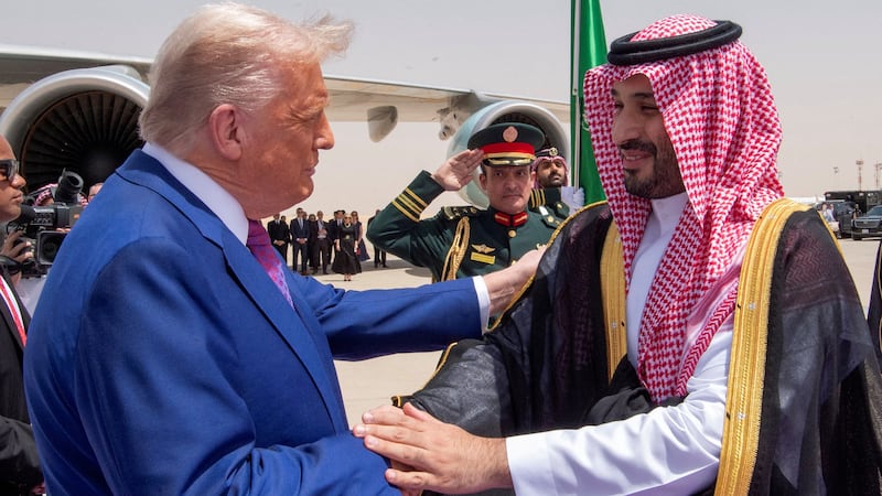President Donald Trump shakes hands with Saudi Crown Prince Mohammed Bin Salman during a welcoming ceremony in Riyadh, Saudi Arabia.