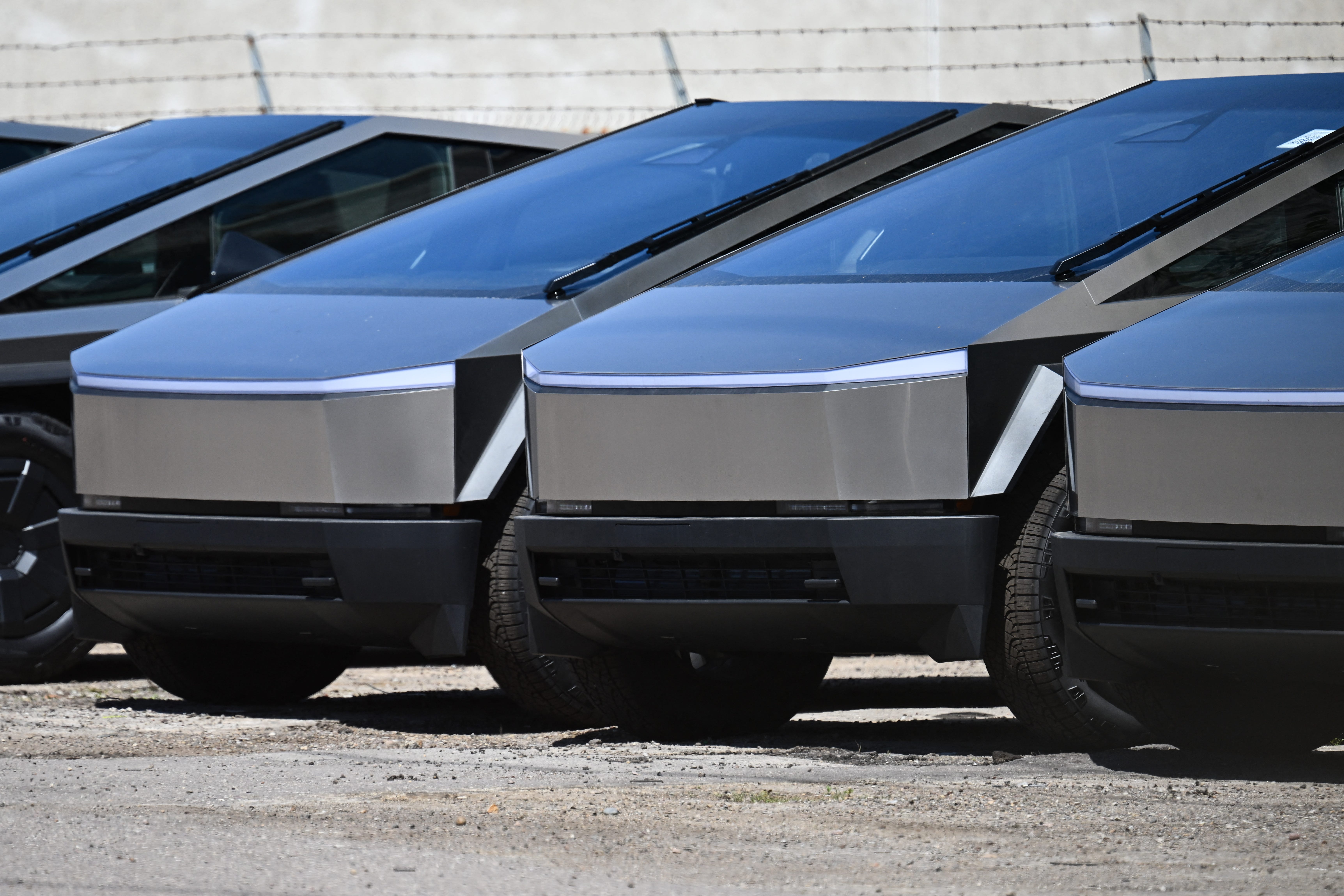 Cybertrucks in a line