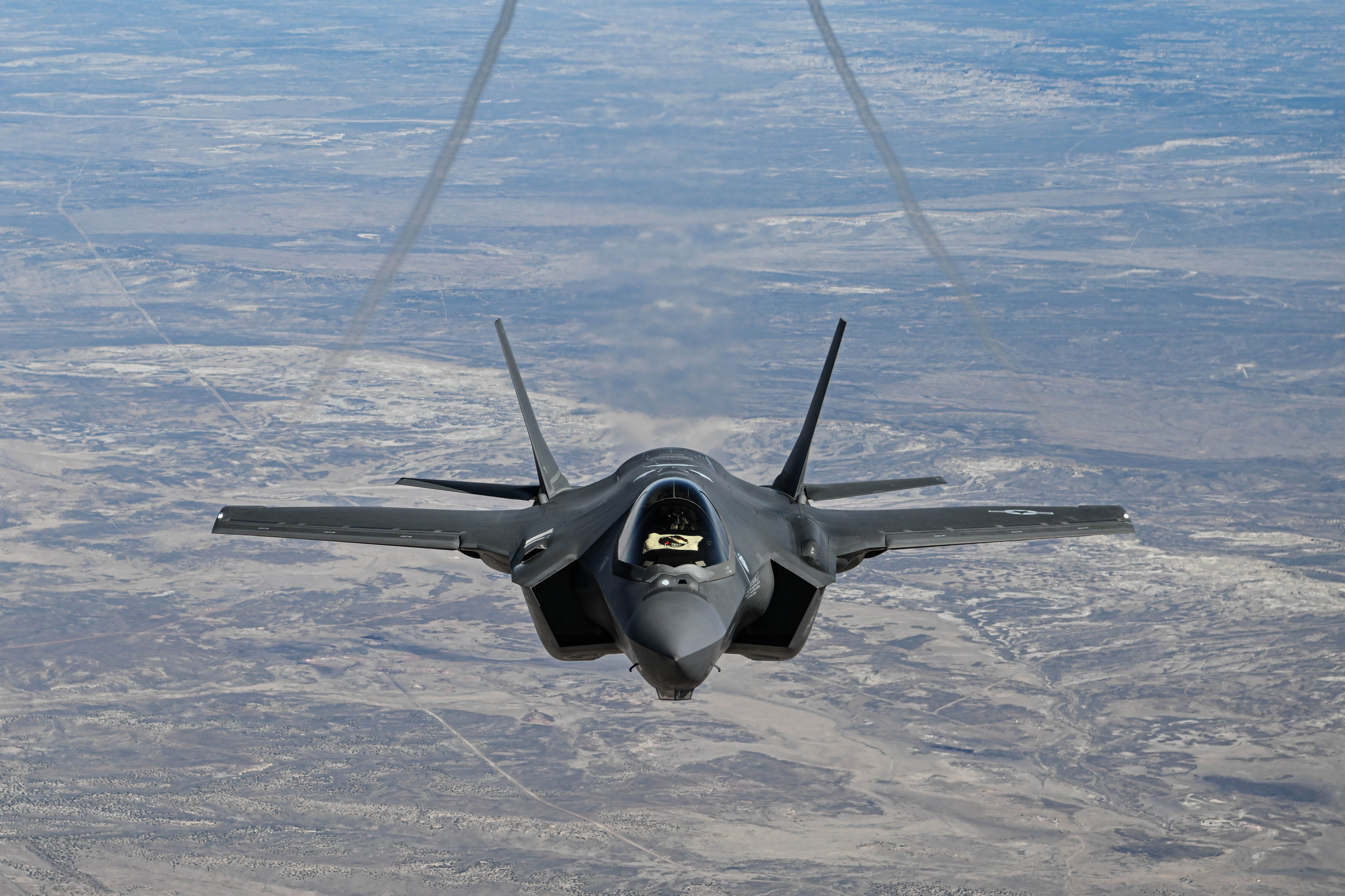 1st Lt. Bailey "Jazz" Roland, safety observer with the F-35A Demonstration Team, pilots an F-35A Lightning II en route to the 2025 Feria Aeroespacial México (FAMEX) at Base Aérea No. 1 de Santa Lucía, Mexico, April 22, 2025.