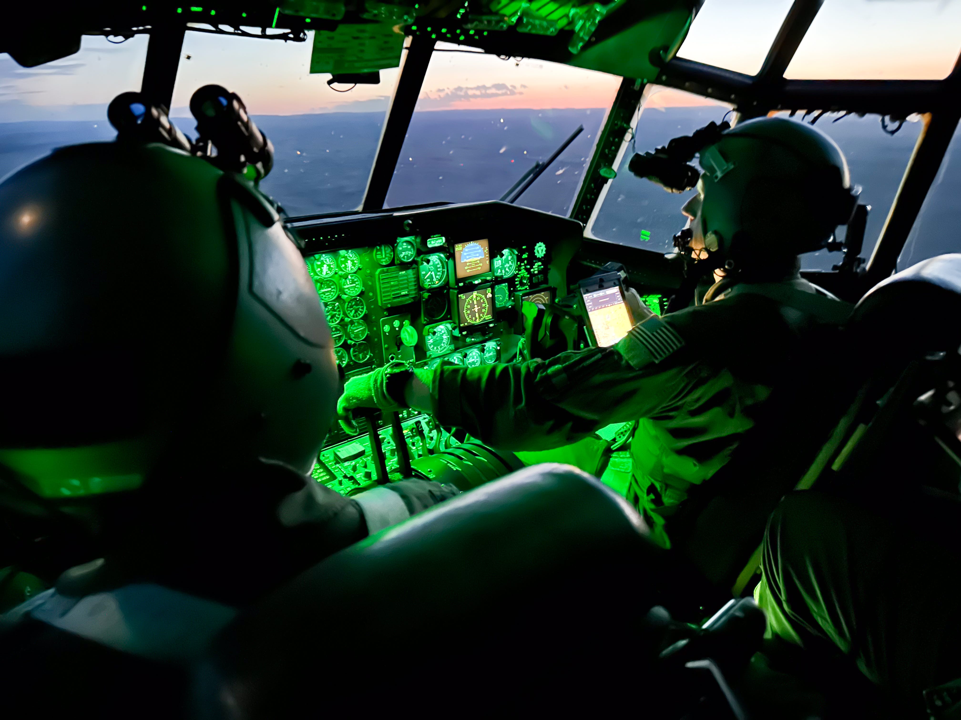 Pilots assigned to the 153d Airlift Wing fly a C-130 Hercules during an evening training flight in Cheyenne, Wyo. on May 17, 2024.