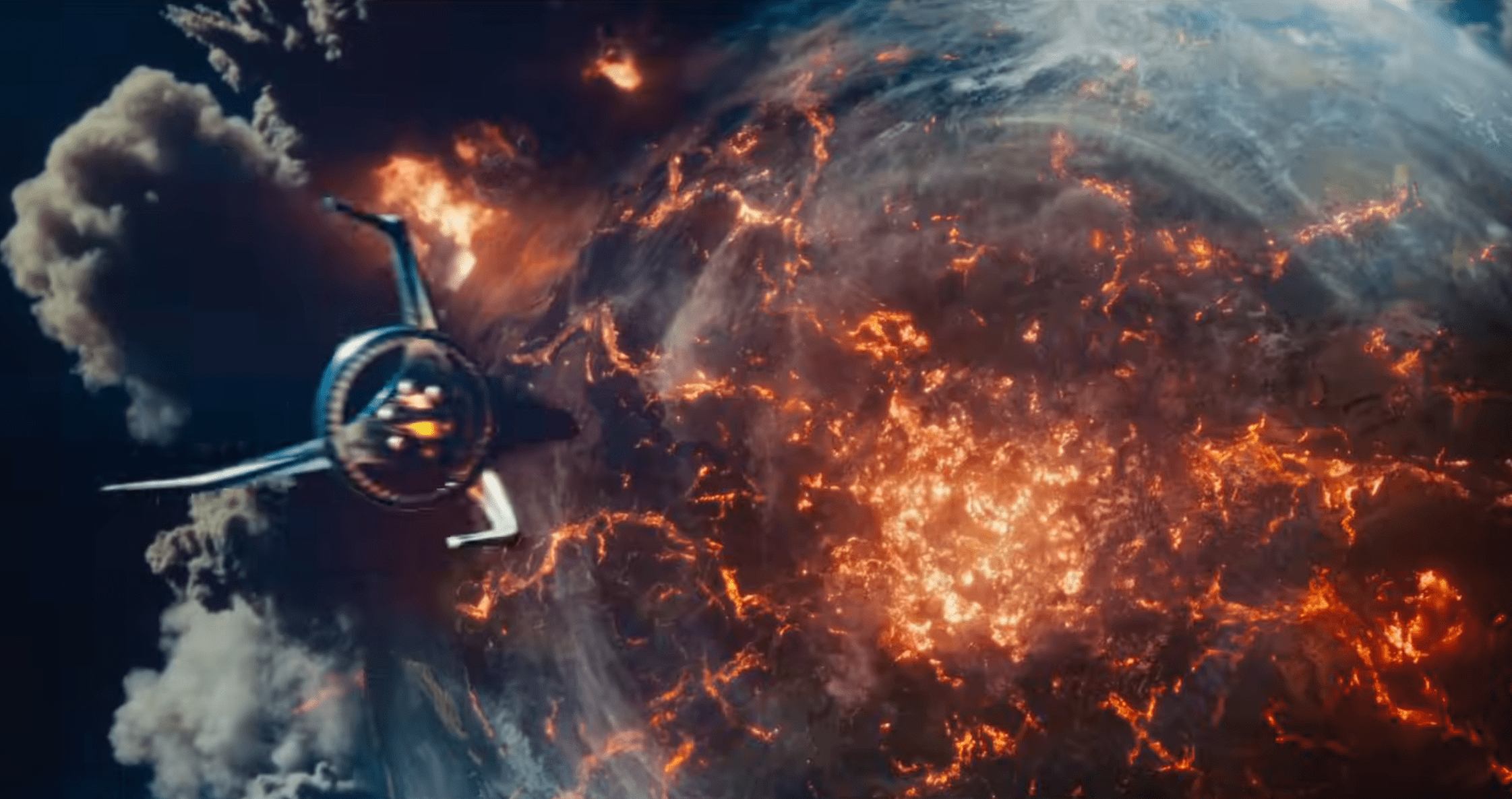A screenshot of the Fantastic Four rocket flying at a molten Earth, in a still from the Fantastic Four: First Steps trailer