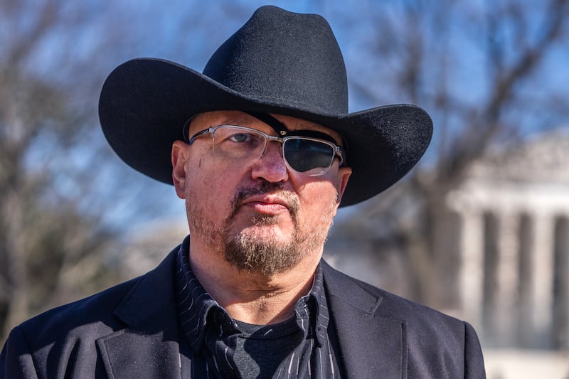 Stewart Rhodes, wearing a cowboy hat and his eye patch, after a news conference at the US Capitol in February.