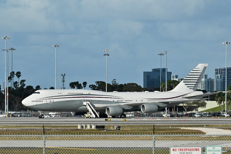 A Boeing 747 sits on the tarmac of Palm Beach International airport after US President Donald Trump toured the aircraft on February 15, 2025. Donald Trump plans to accept a luxury Boeing jet from the Qatari royal family for use as Air Force One.