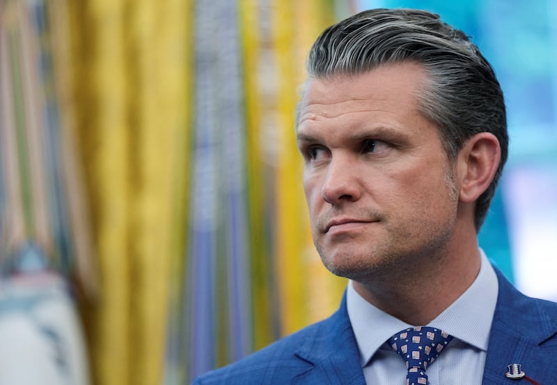 Pete Hegseth looks on as he attends the signing of an executive order by President Donald Trump, at the White House.
