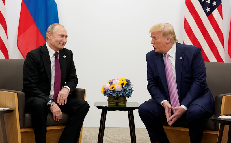 Russia's President Vladimir Putin and U.S. President Donald Trump talk at a summit in Japan in June 2019.