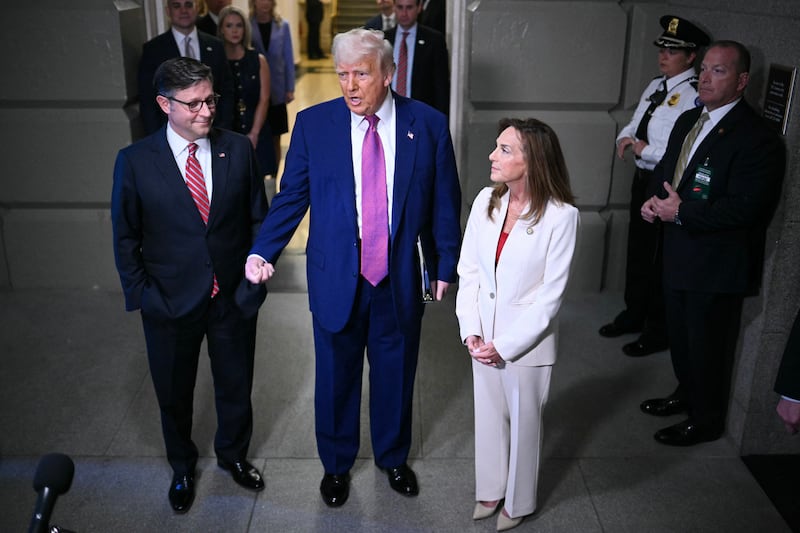 President Donald Trump speaks to reporters as he arrives for a House Republican meeting at the U.S. Capitol on May 20, 2025.