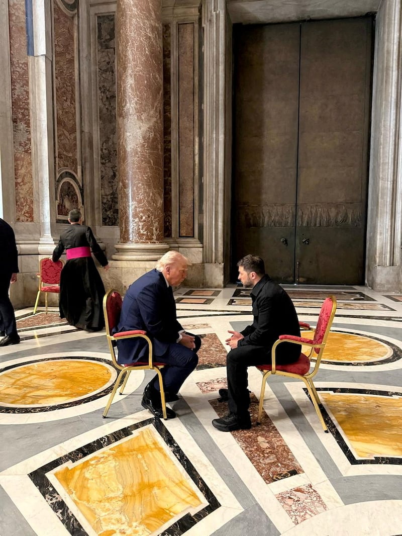 Ukraine's President Volodymyr Zelenskiy and U.S. President Donald Trump appear at a meeting, while they attend the funeral of Pope Francis, at the Vatican April 26, 2025.