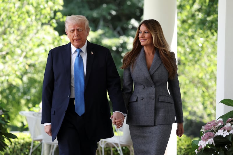 President Donald Trump walks to the Rose Garden of the White House for a signing ceremony on May 19 after speaking to Russian President Putin that morning.