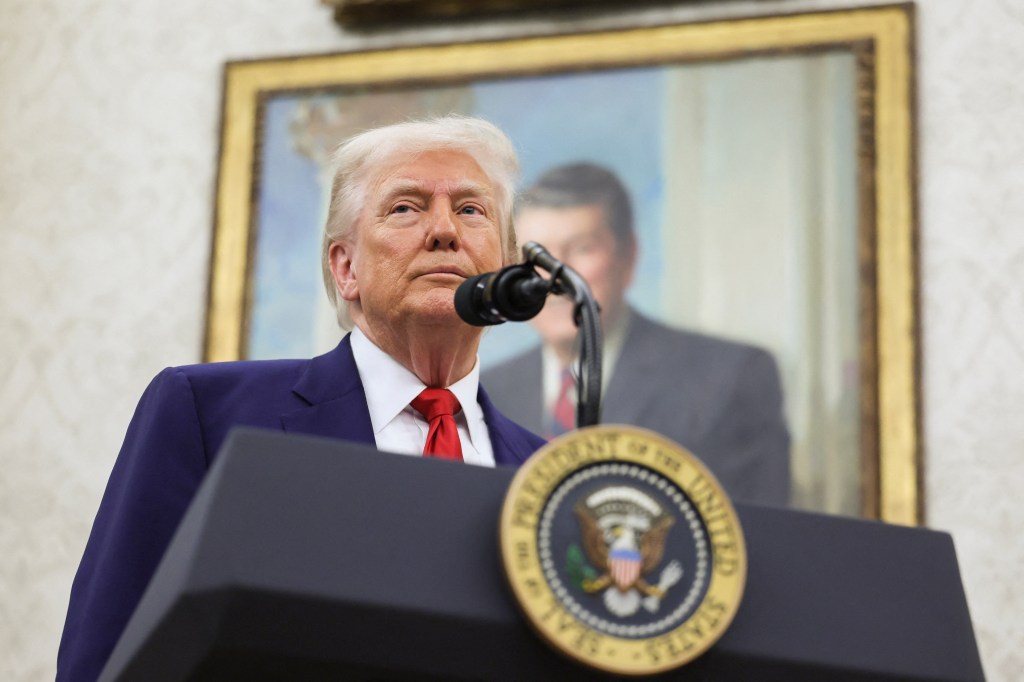 U.S. President Donald Trump looks on as he takes questions from the press during a swearing-in ceremony for the interim U.S. Attorney for the District of Columbia, Jeanine Pirro, at the White House in Washington, D.C., U.S., May 28, 2025. 