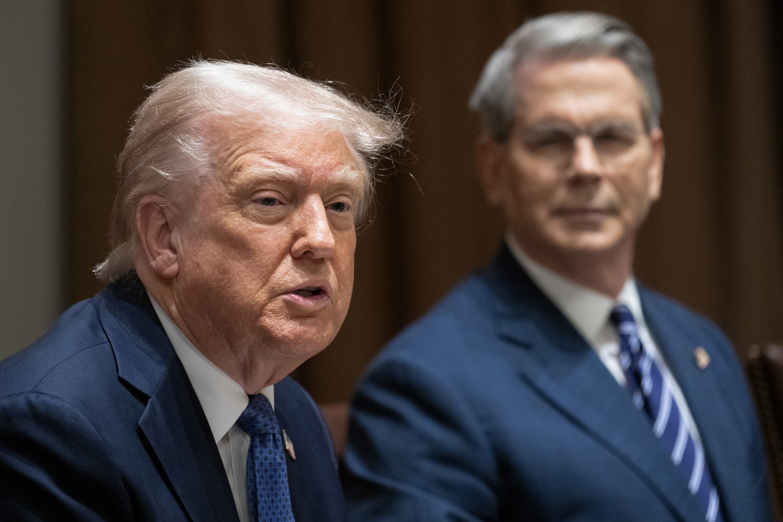 Donald Trump speaks alongside Treasury Secretary Scott Bessent