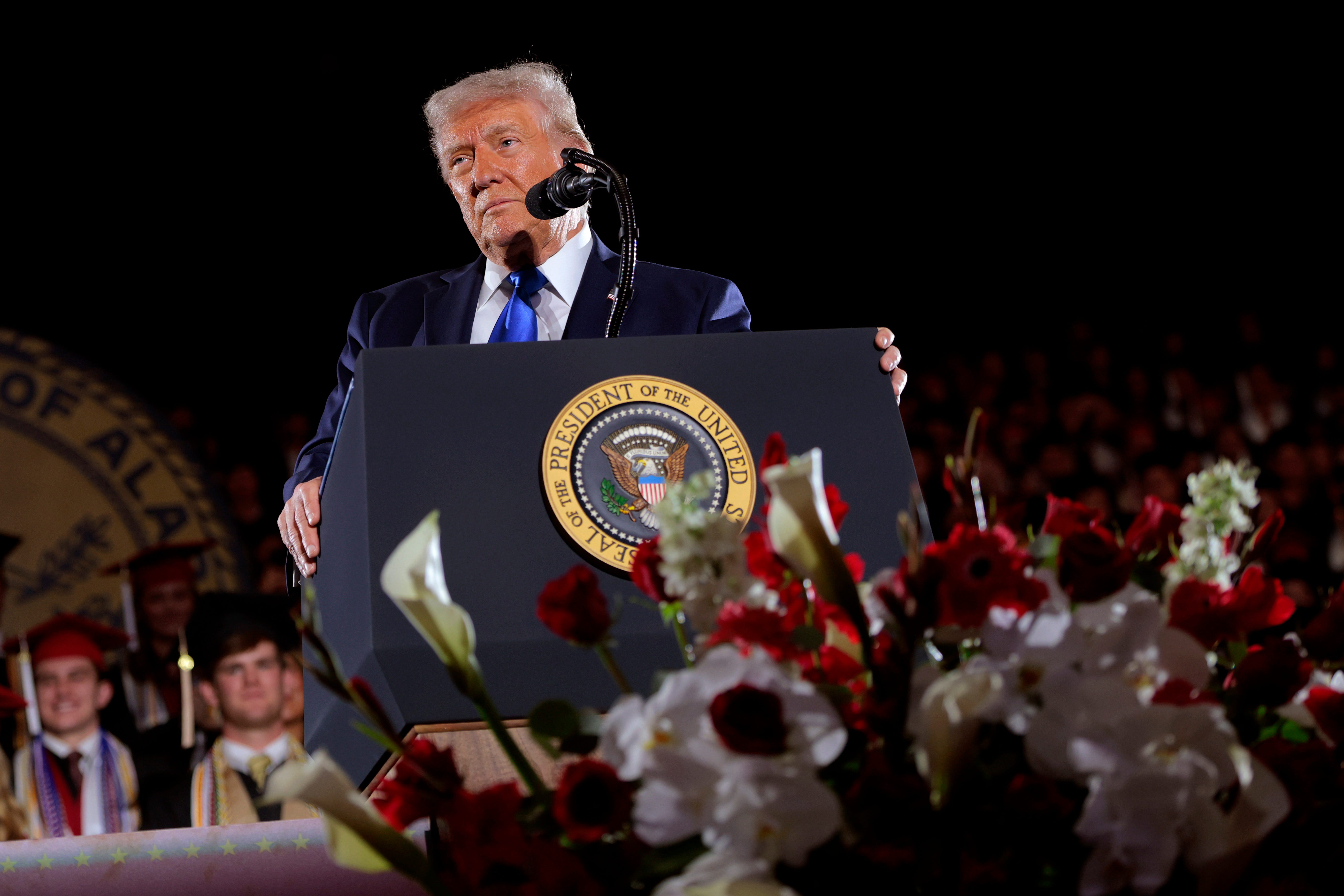 President Donald Trump speaking to graduates from the University of Alabama.