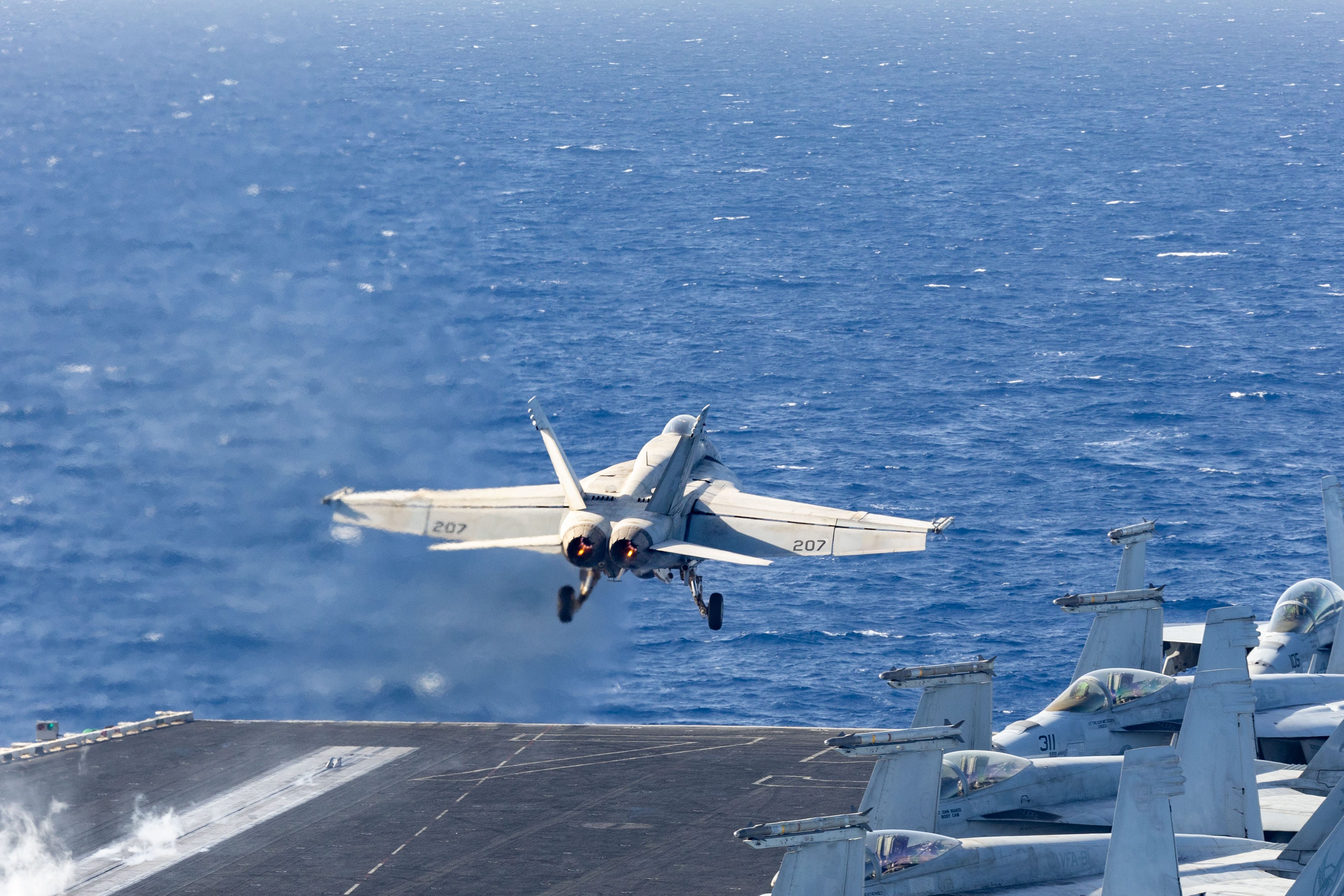 An F/A-18E Super Hornet, attached to Strike Fighter Squadron (VFA) 143, launches from the flight deck of the Nimitz-class aircraft carrier USS Harry S. Truman (CVN 75) during flight operations in the U.S. Central Command area of responsibility.