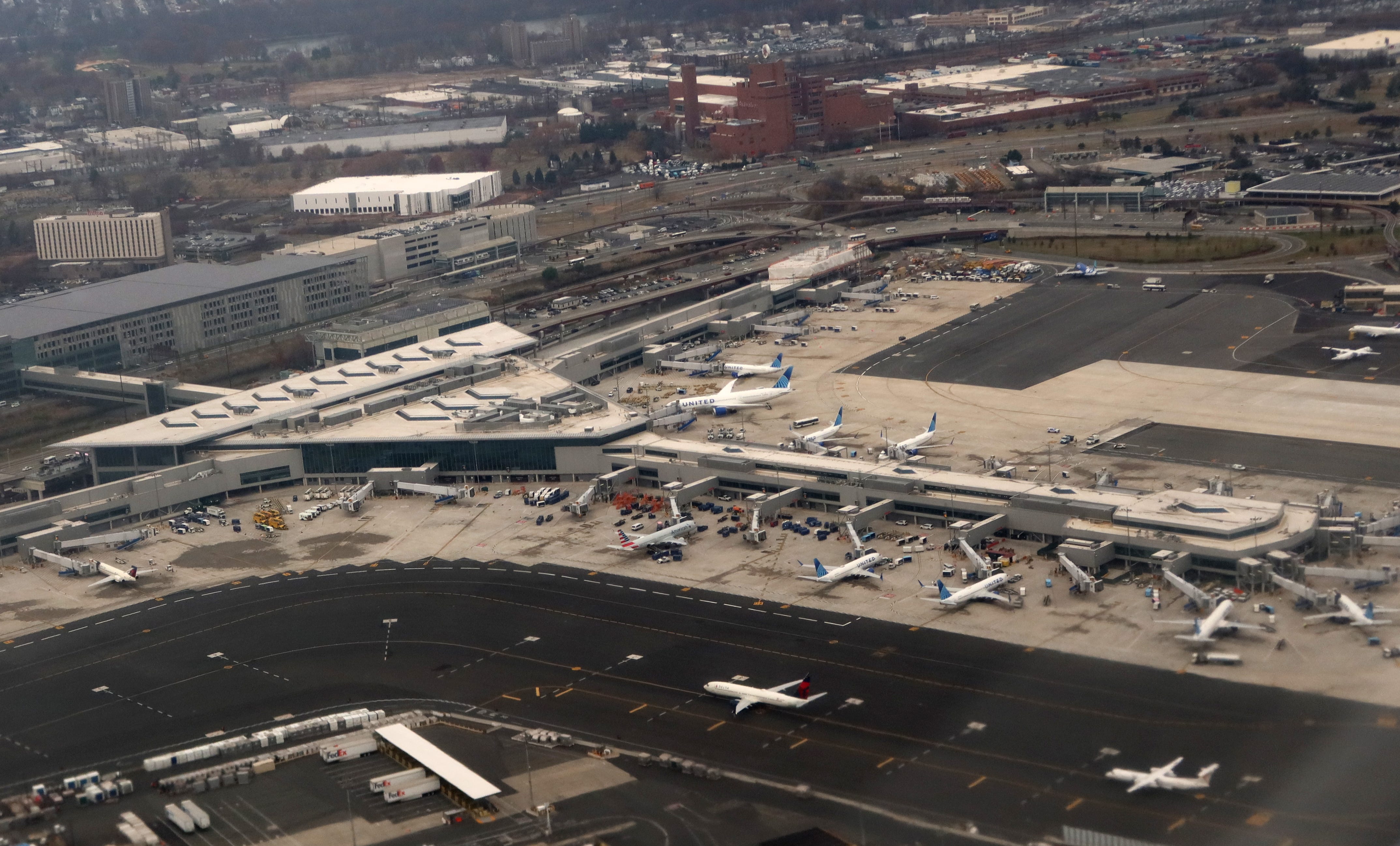 Airplanes sit parked at gates at Terminal A at Newark Liberty International Airport on December 4, 2024, in Newark, New Jersey.