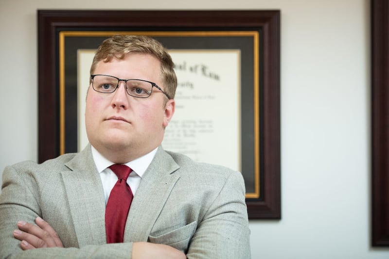 Wren Williams, the GOP candidate for the Virginia House of Delegates for the 9th District, leans against his desk during a visit to his law office, Schneider & Williams, P.C., in Stuart, Virginia on June 21, 2021.