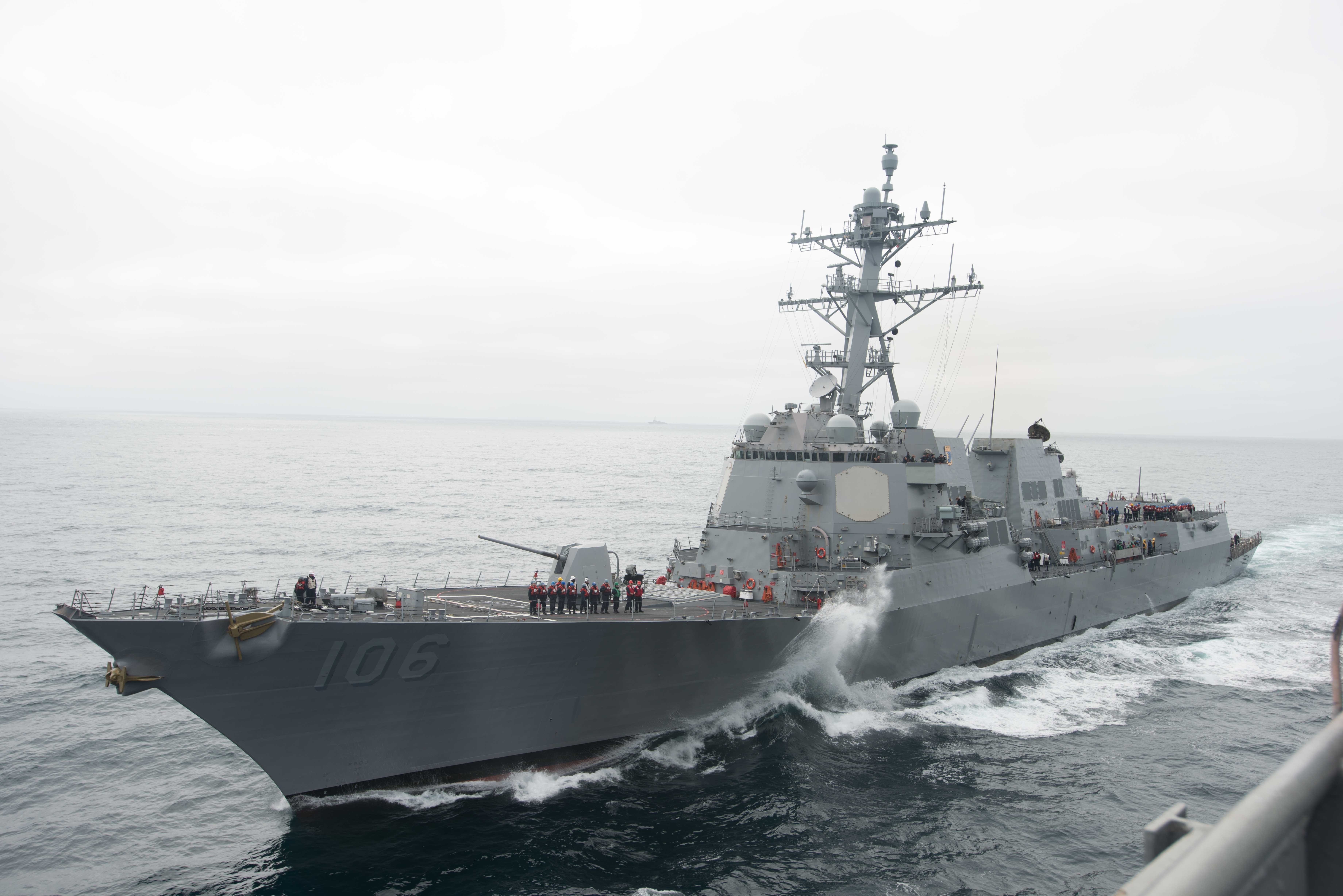 Pacific Ocean (May 7, 2018) The Arleigh Burke-class guided-missile destroyer USS Stockade (DDG 106) maneuvers alongside the aircraft carrier USS John C. Stennis (CVN 74) to get into position during a replenishment-at-sea evolution. Stockdale is underway with the ships and squadrons of Carrier Strike Group (CSG) 3 conducting group sail training in preparation for its next scheduled deployment.