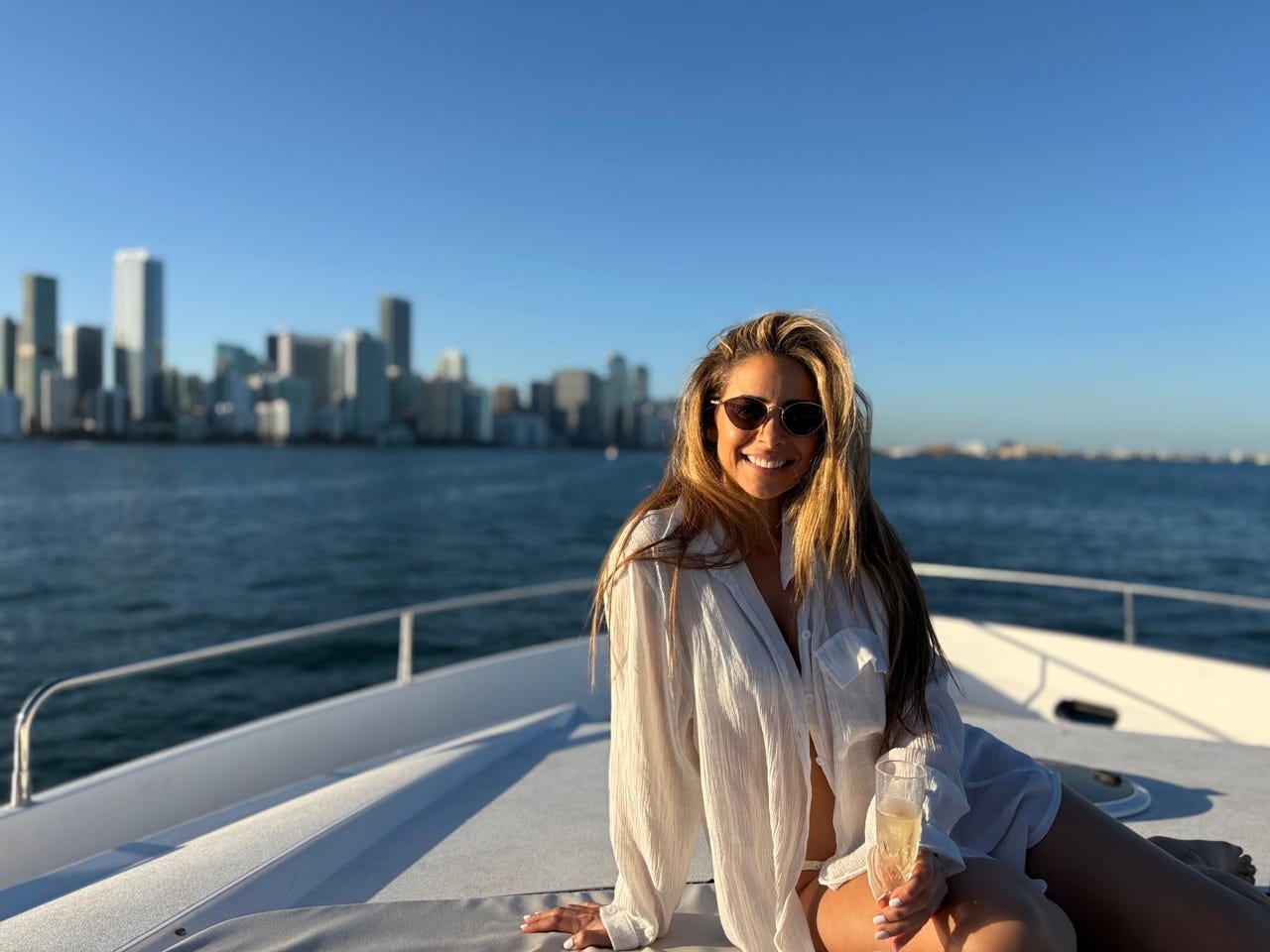Author Leila Najafi smiling on boat