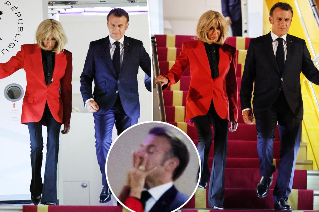 What French President Macron and wife Brigitte said to each other after she shoved him: lip reader