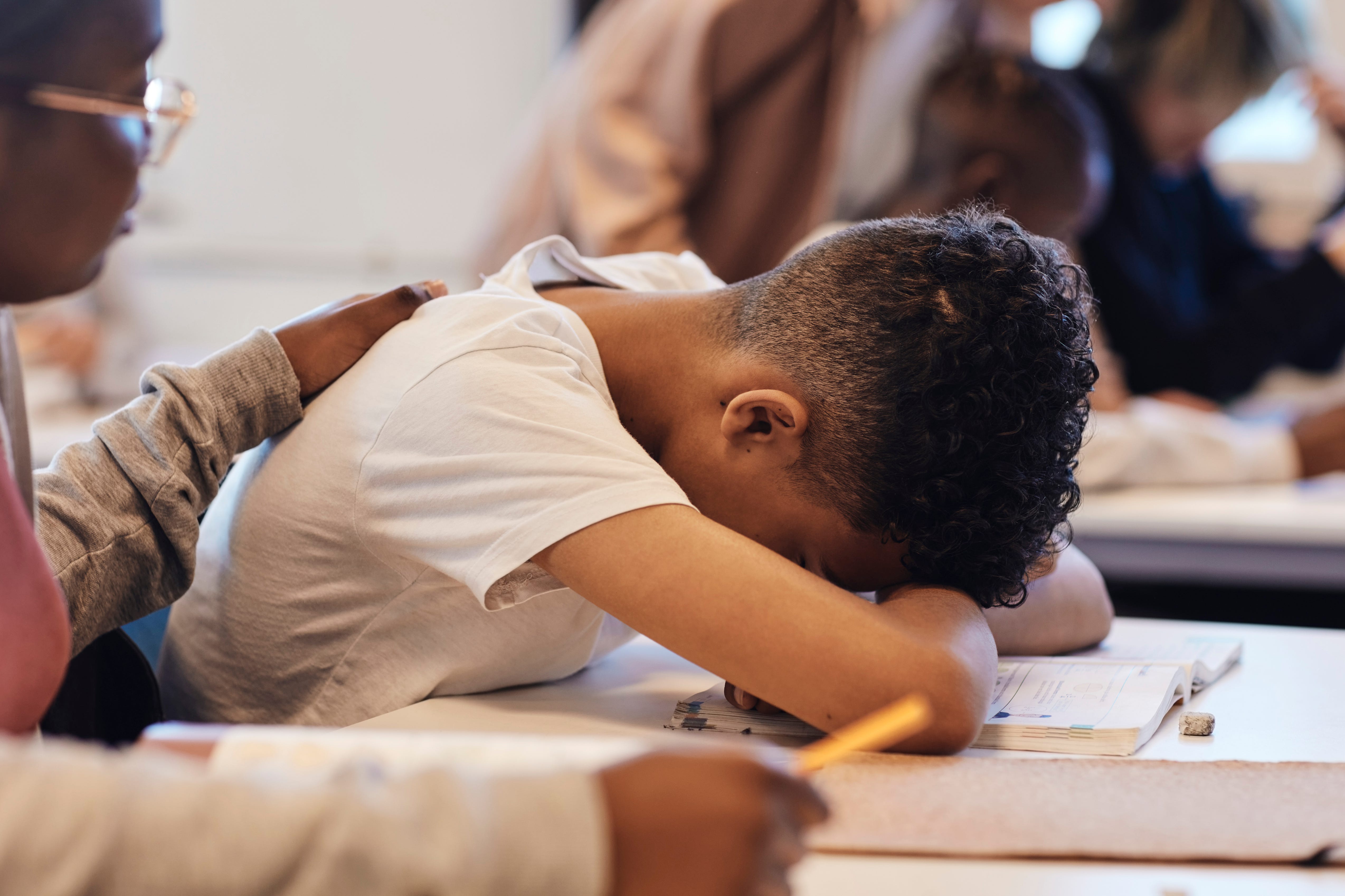 Teacher alms a student
