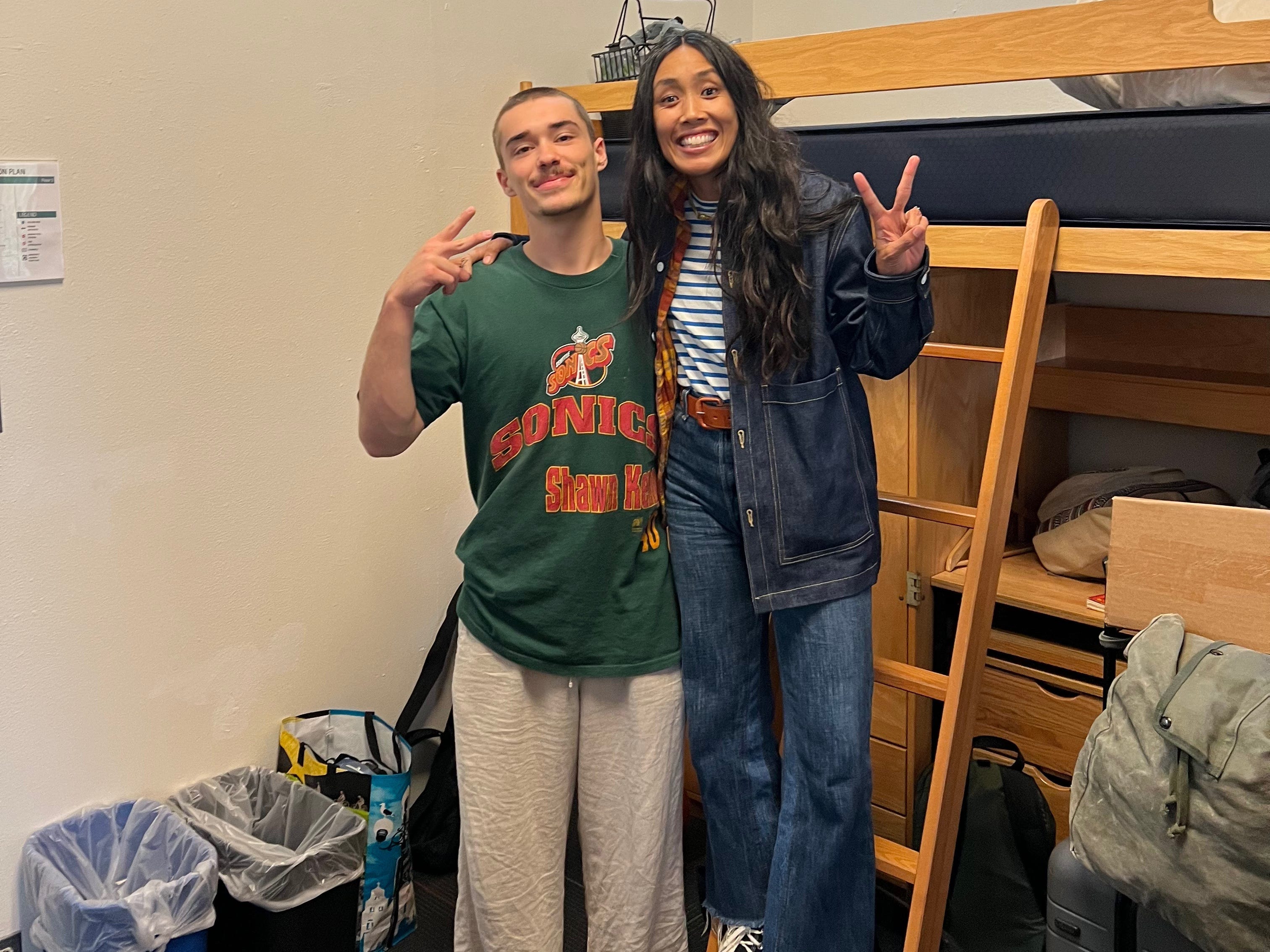 Aunt and nephew posing for a photo