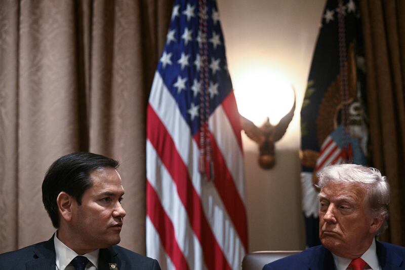 President Donald Trump listens to Secretary of State Marco Rubio speak during a cabinet meeting at the White House on April 10, 2025 in Washington, D.C.
