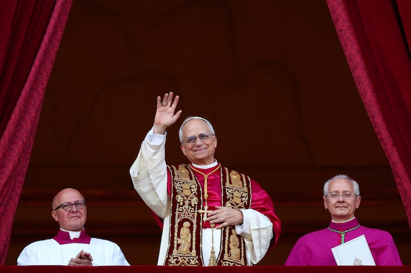 Cardinal Robert Prevost appears on the balcony of St. Peter's Basilica on Thursday. He is the first American pope.