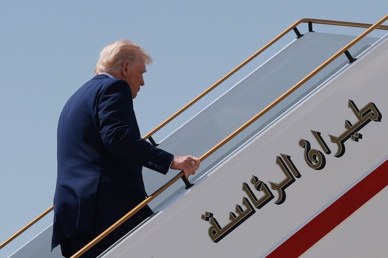 President Donald Trump boards Air Force One as he departs the Al Bateen Executive Airport on May 15, 2025, in Abu Dhabi, United Arab Emirates. He was unable to broker a peace deal between Ukraine and Russia.