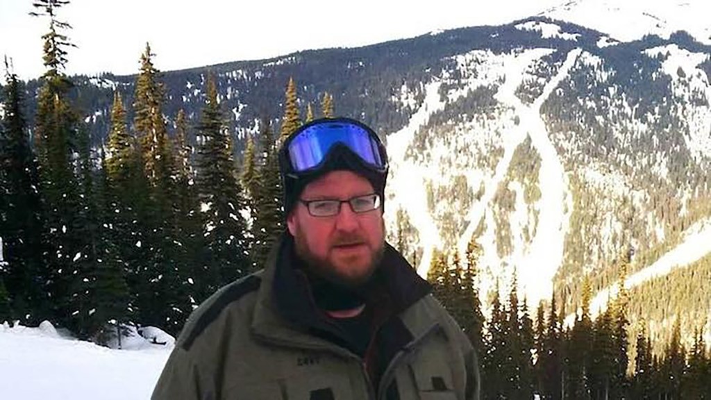 A photo showing Patrick Lutts Jr. skiing. 