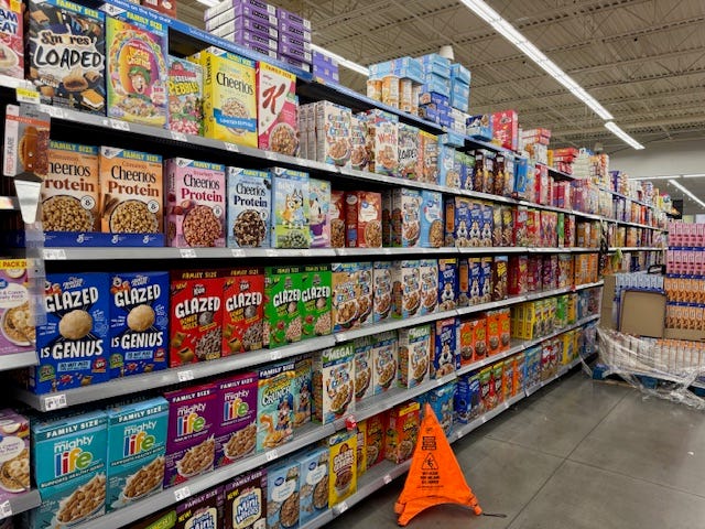 Cereal aisle filled with boxes at Walmart