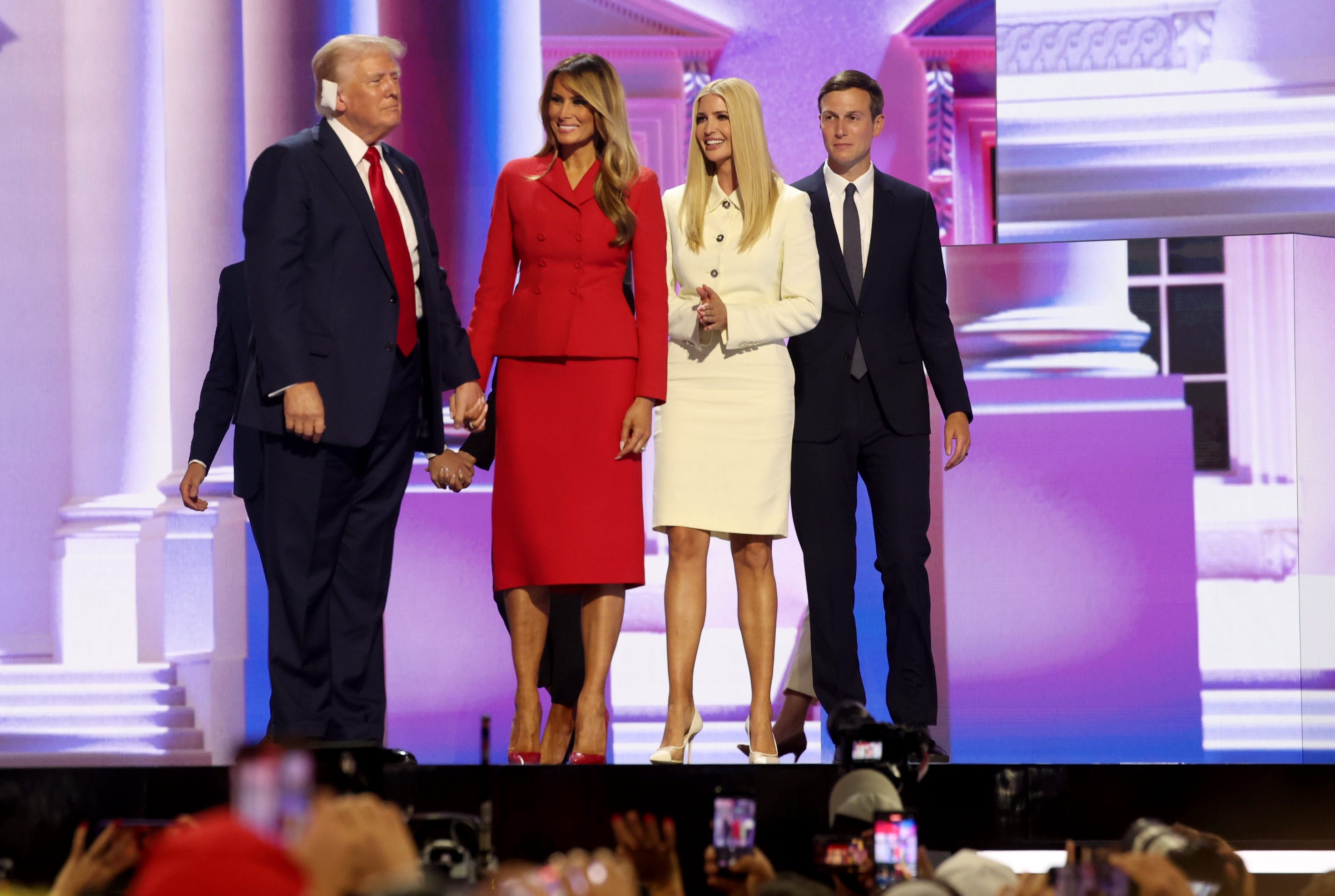 Donald Trump, Melania Trump, Ivanka Trump, and Jared Kushner onstage.