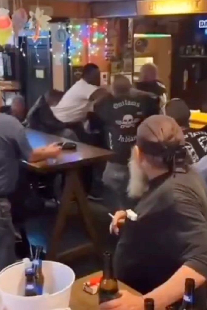fight beginning at indiana bar between Black man and biker gang