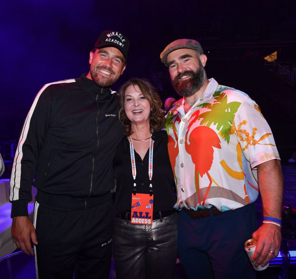 Travis Kelce and Jason Kelce with a woman at the Big Slick Celebrity Weekend charity event on Saturday.