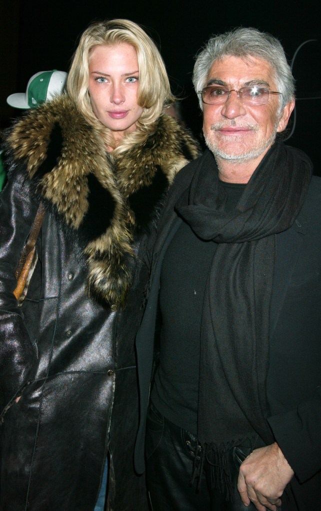 Roberto Cavalli and Crystal McKinney pose for a photo in 2003
