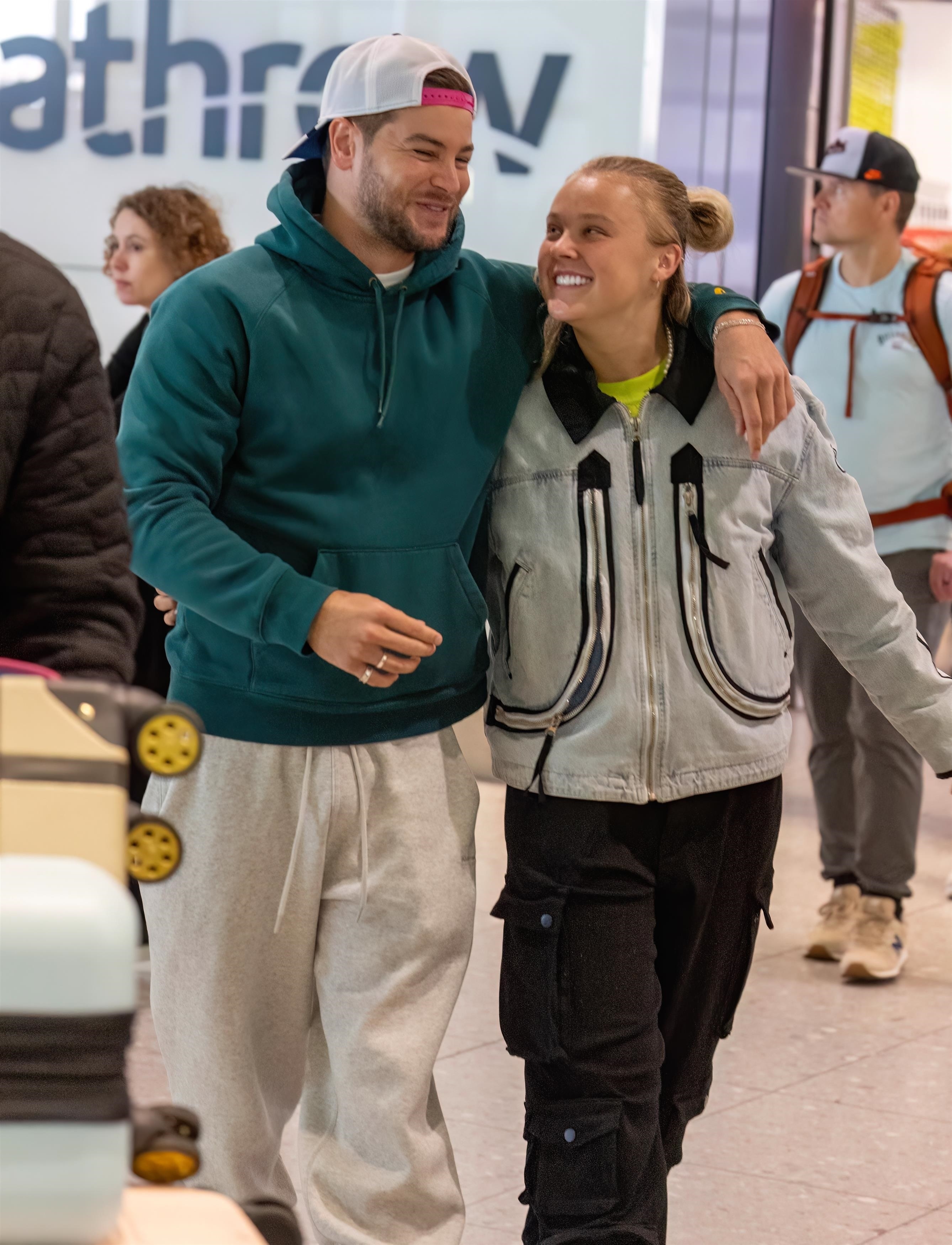 JoJo Siwa and Chris Hughes in the London airport