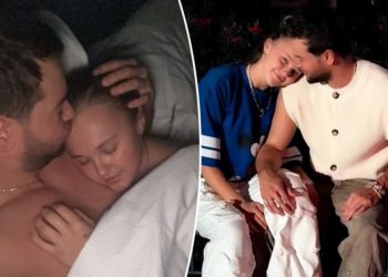 Chris Hughes shares intimate photo of himself and ‘sleeping beauty’ JoJo Siwa cuddling in bed
