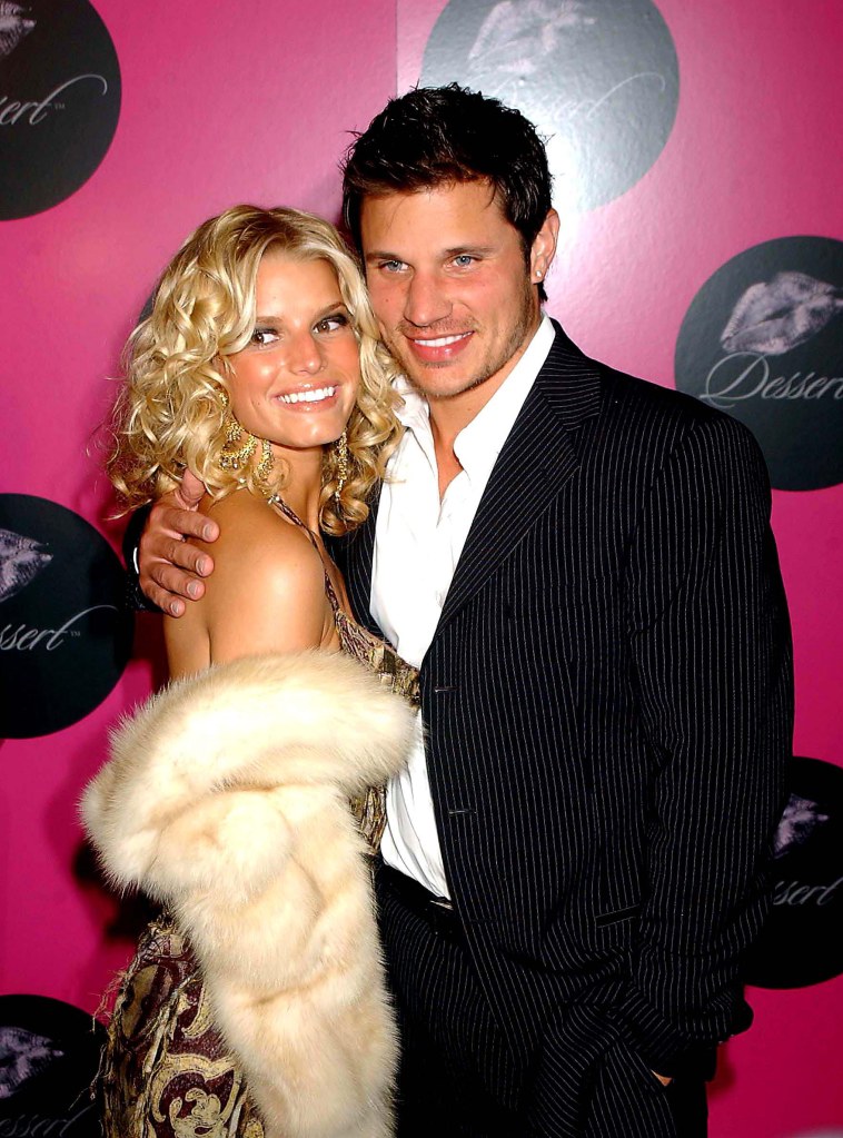 Jessica Simpson and Nick Lachey posing at an event in NYC in 2004.