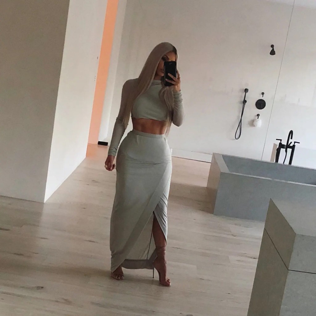 Kim Kardashian poses in a mirror selfie.