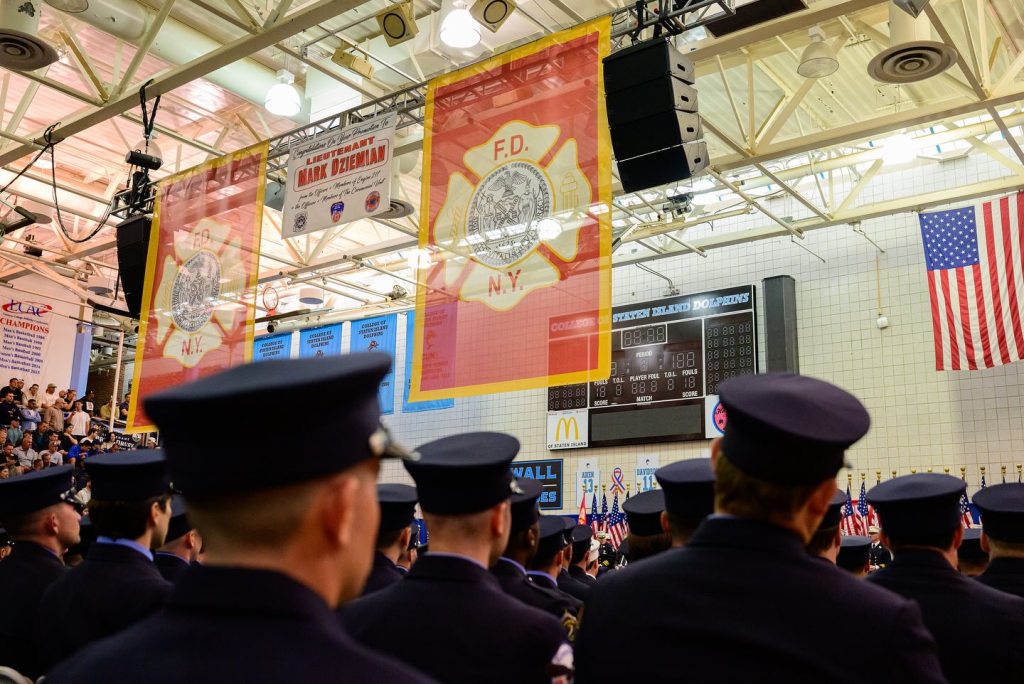 A sign honoring Dziemian hanging at the College of Staten Island during the promotion ceremony.