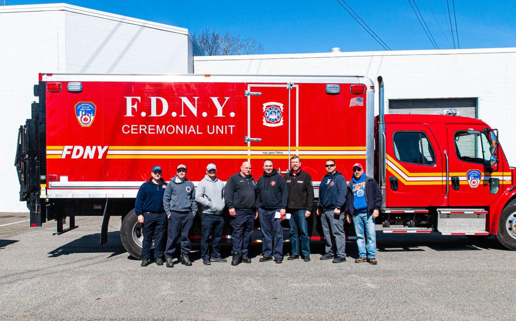 Dziemian with fellow firefighters at Engine 217 in Bushwick.