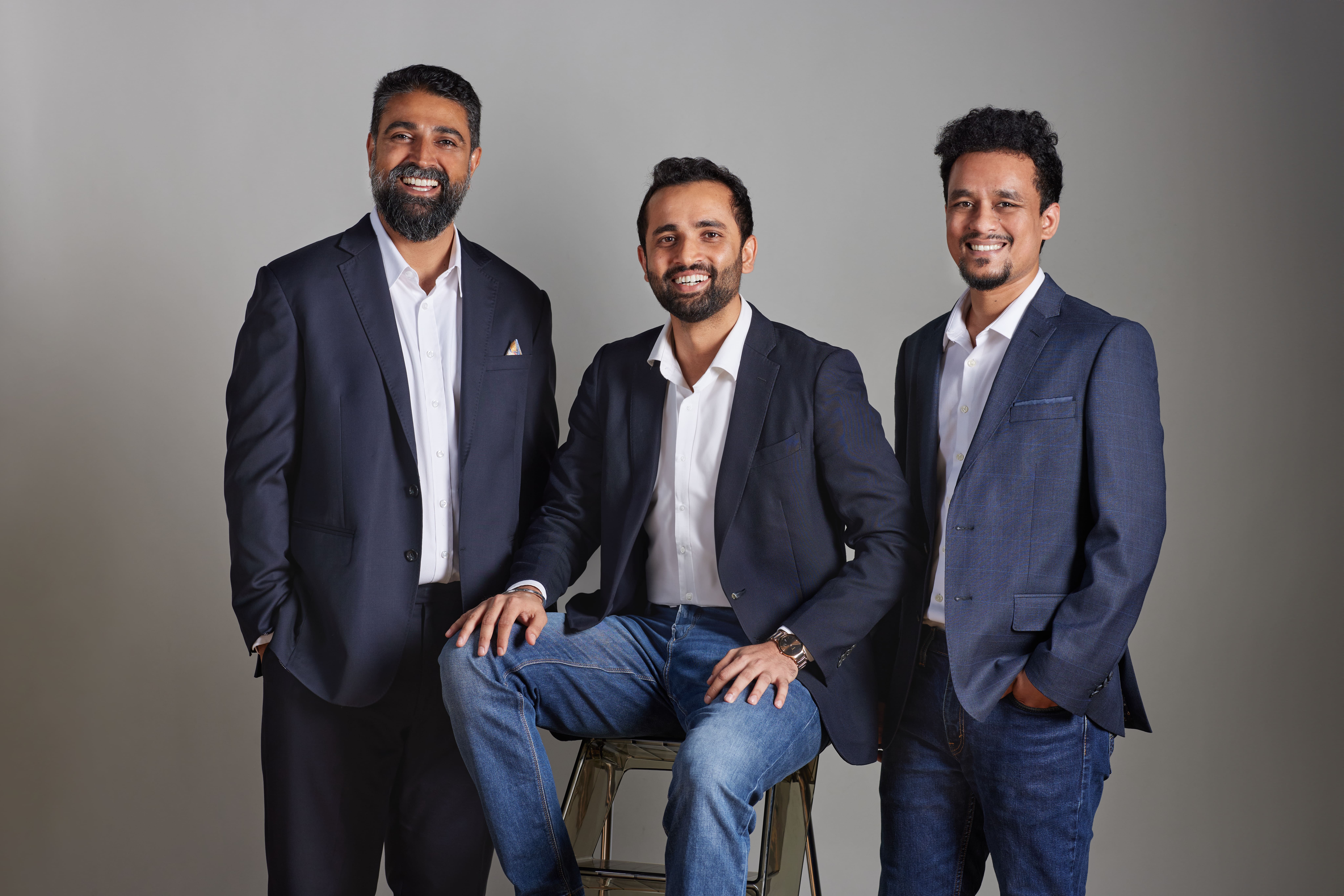Sagar Khatri (center) with the cofounders of Multiplier.