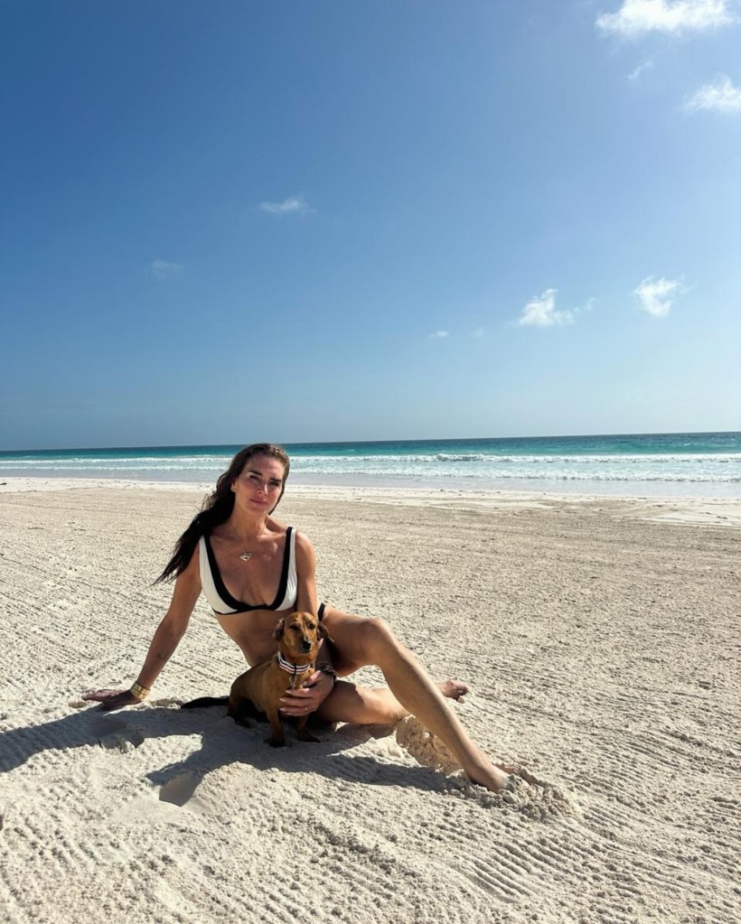 Brooke Shields poses on the beach.