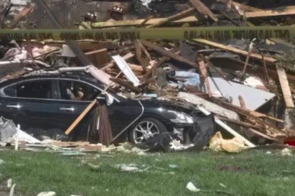 The explosion in the suburb of Kansas City killed one person and one dog.