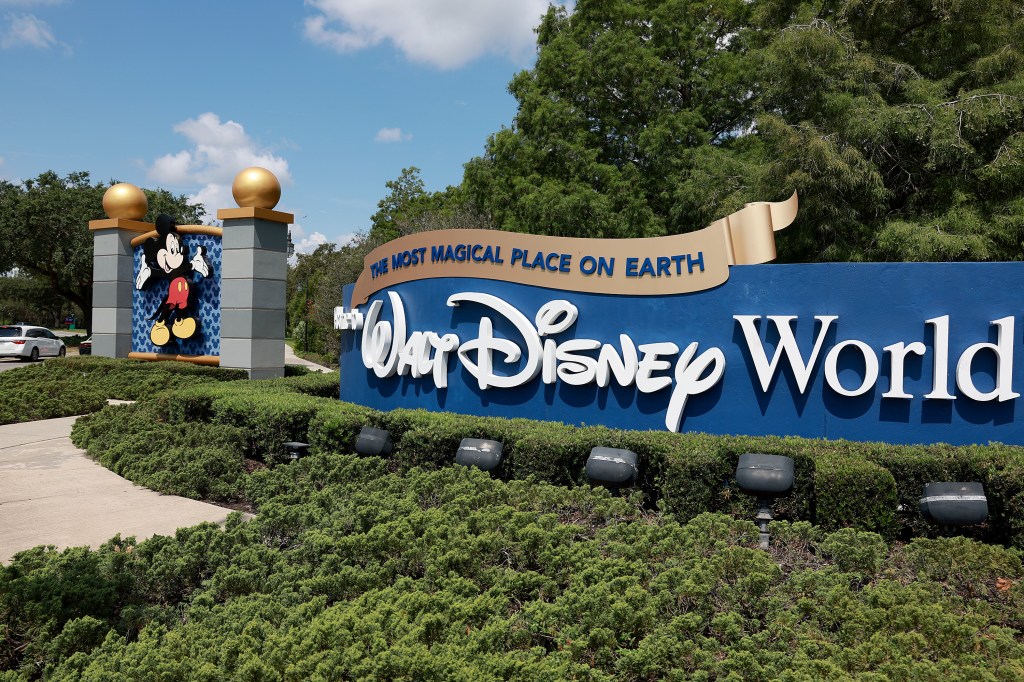 A sign near an entrance to Walt Disney World in Orlando, Florida, photographed on May 22, 2023.
